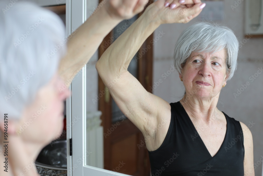 Senior woman with excessive armpit odor Senior woman with excessive armpit odor