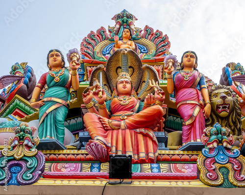 Colorful figures at a landmark Hindu temple in downtown Singapore