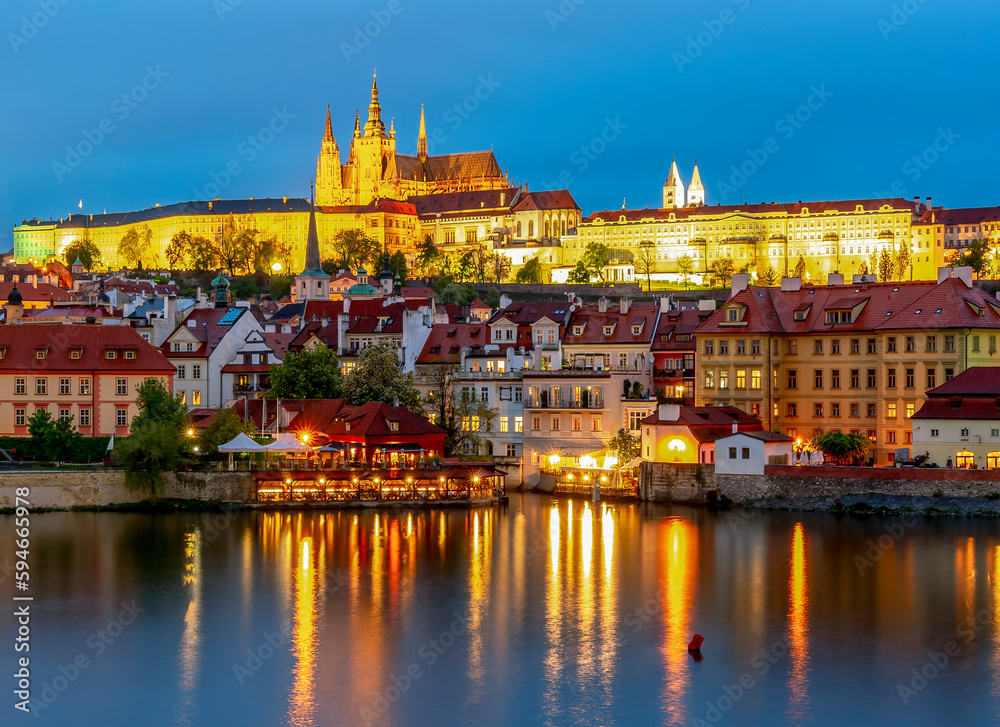 Prague castle with St. Vitus Cathedral over Lesser town (Mala Strana) at sunset, Czech Republic