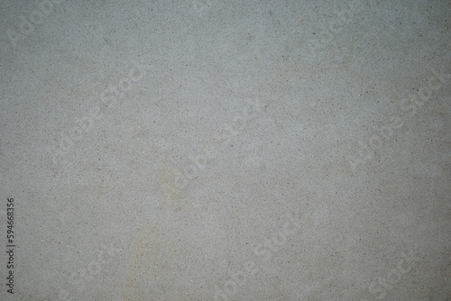 Polished concrete surface. Gray background.
