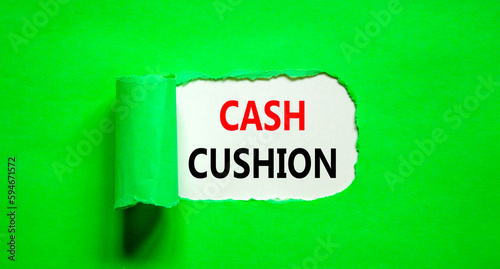 Cash cushion symbol. Concept words Cash cushion on beautiful white paper. Beautiful green table green background. Business and Cash cushion concept. Copy space.