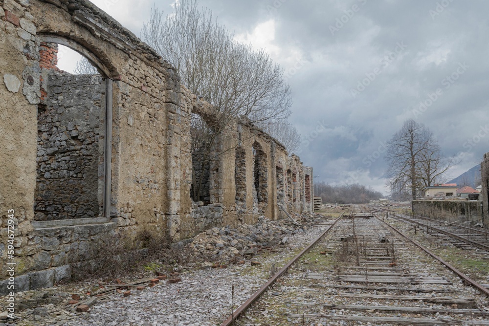 A view of an abandoned railroad station on a disused railroad
