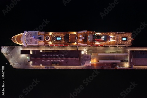 Obraz na plátně a very big ship at night with lights in it's hull