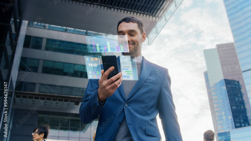 On Busy City Street Handsome Businessman Uses Smartphone with Edited Visual Holographic Screens Show Business Graphs, Charts and Stock and Crypto Market Analysis Statistics. Mock-up Mobile OS UI/UX. - obrazy, fototapety, plakaty 