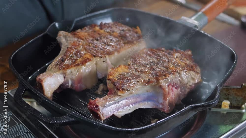 Beef steak. Grill. Chef grills beef steak. BBQ party, vacation meeting friends. Raw fresh meat. Meat for steak.