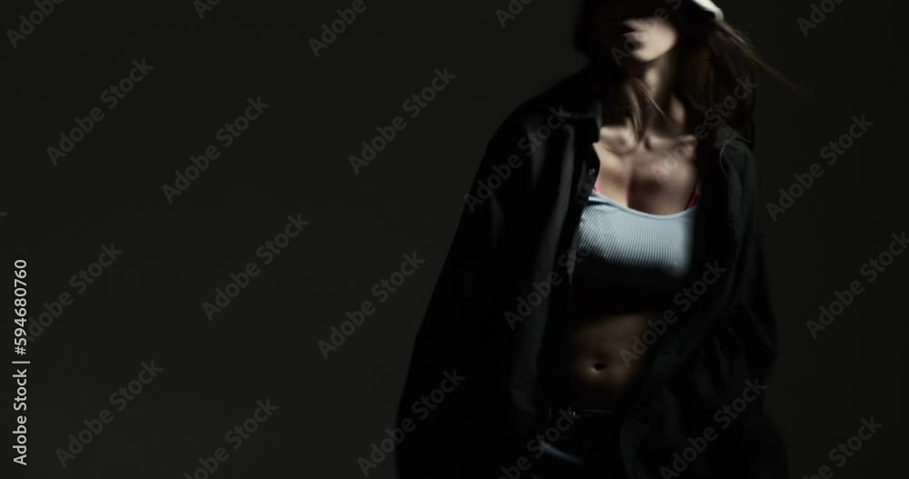 Stylish young woman dancing in hip hop free style moves Stylish young woman dancing in hip hop free style moves