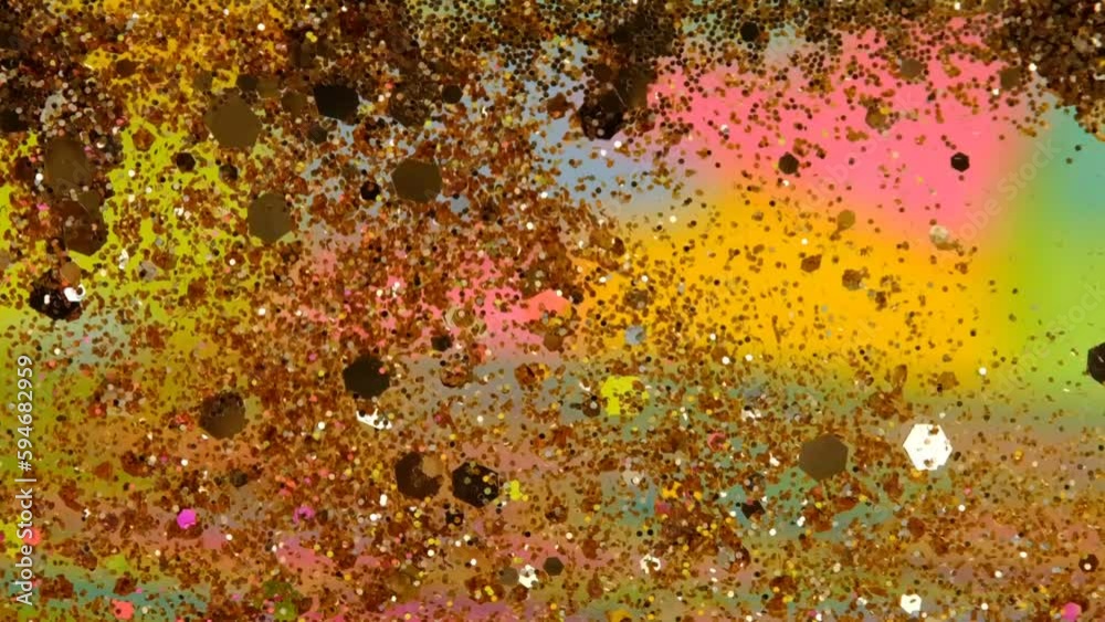 slow motion of abstract gold sparkle on multicolored paper sticky notes background. Beautiful transition with real gold particles. shot with depth of field. slow motion of abstract gold sparkle on multicolored paper sticky notes background. Beautiful transition with real gold particles. shot with depth of field.