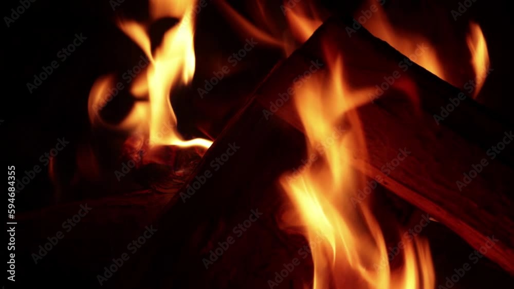 Video of fire with firewood (dry wood) in macro shot, detail. Video of fire with firewood (dry wood) in macro shot, detail.