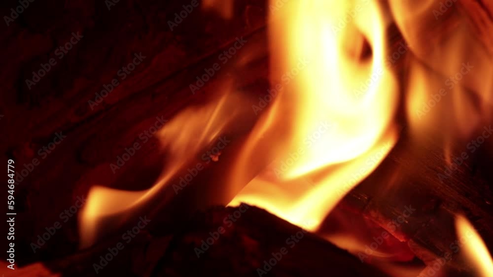 Video of fire with firewood (dry wood) in macro shot, detail. Video of fire with firewood (dry wood) in macro shot, detail.