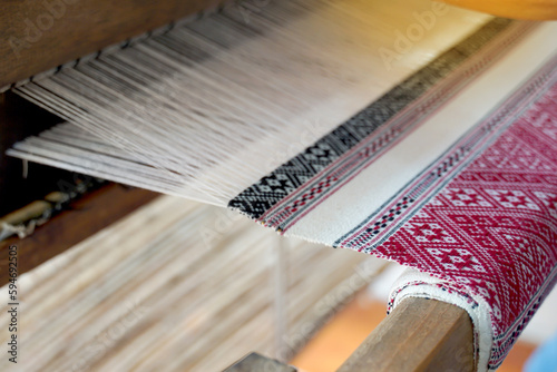Woven fabrics with local patterns that are detailed, beautiful, meticulous and have meanings according to that local way of life. woven by hand loom. Soft and selective focus.