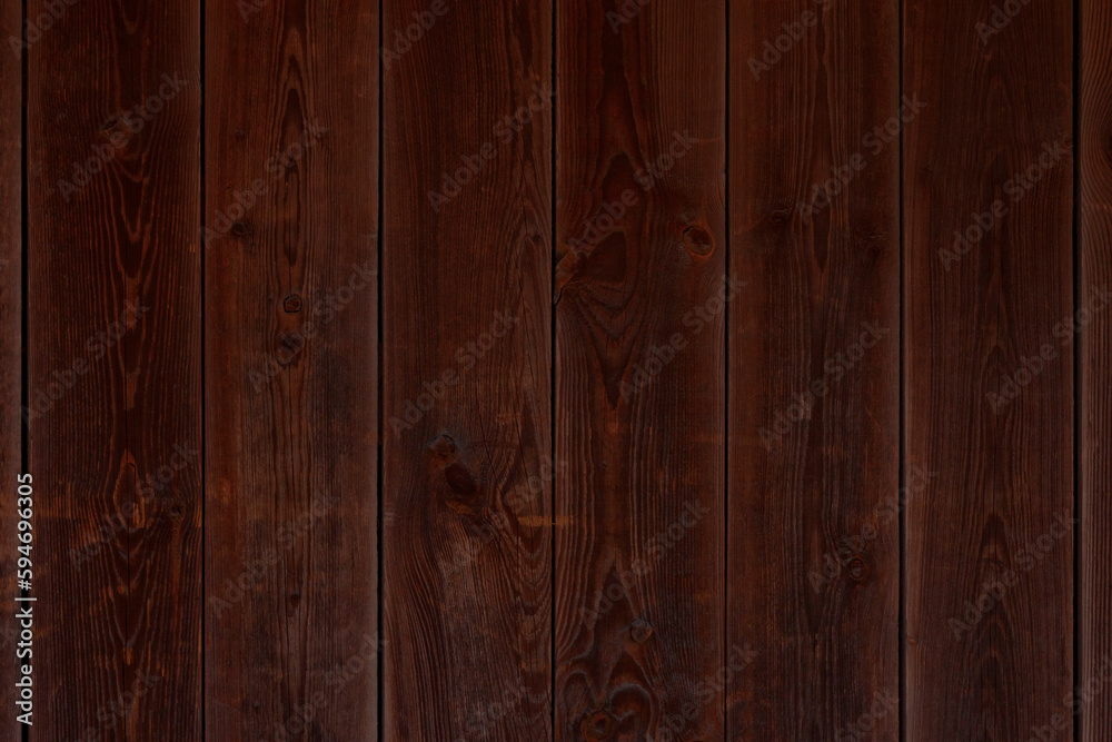 dark brown wooden wall made of planks
