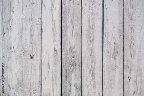 wooden fence made of unpainted boards, close-up shot