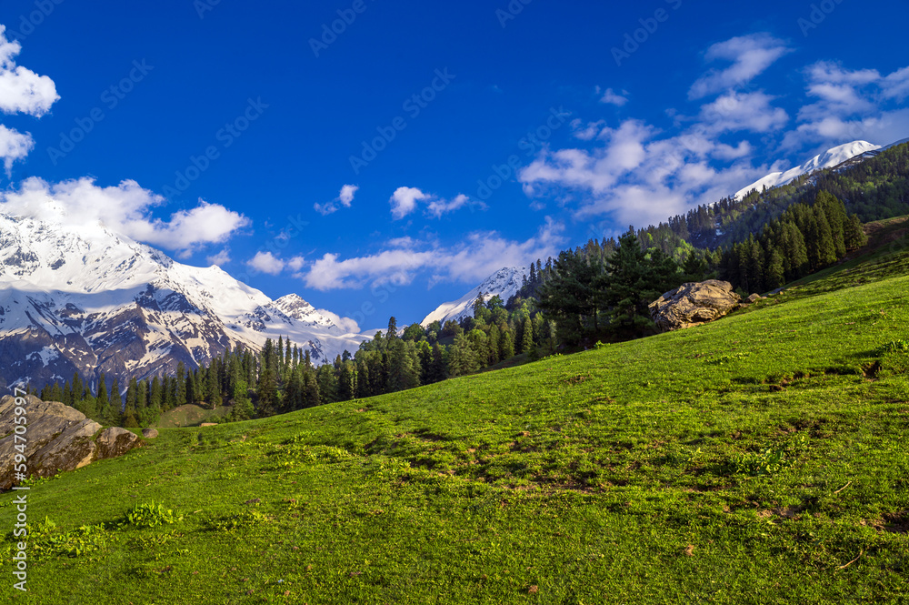 Landscape in the mountains. Himalayan peaks and alpine landscape from the trail of Sar Pass trek in Parvati Valley. Himalayan region of Kasol, Himachal Pradesh, India.