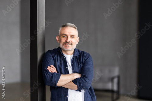 Happy middle aged good looking casual man at home, smiling. © F8  \ Suport Ukraine