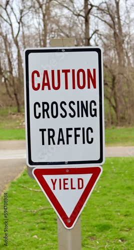 A close view of the road signs on the side of the road.