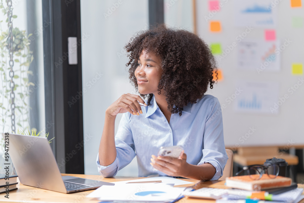 portrait of Beautiful Asian African businesswoman with smiling working in the office. portrait of Beautiful Asian African businesswoman with smiling working in the office.