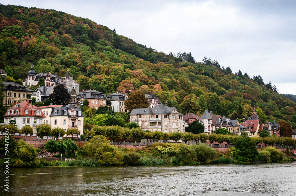 The lovely waterfront houses of Heidelberg's Old Town create a charming, romantic atmosphere that attracts tourists. 