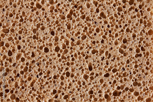 Foam sponge texture. The pores are clearly visible in close-up.