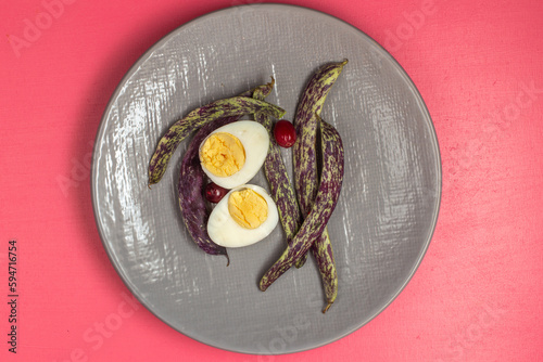 top view boiled egg with fresh beans inside plate on pink background food meal egg plant raw color phoot photo