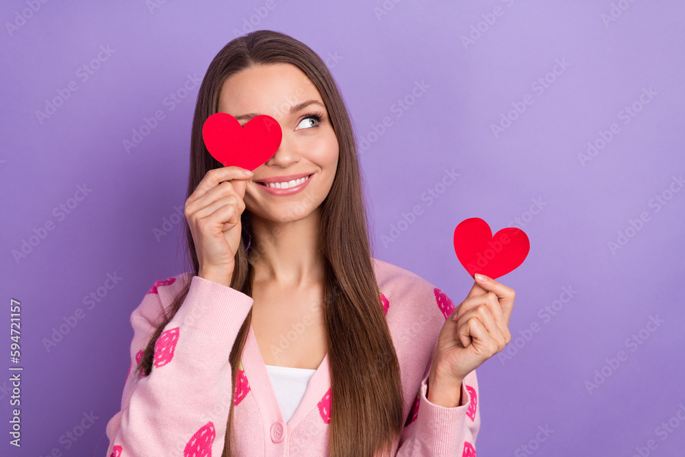 Photo of funny thoughtful girl wear berry print cardigan looking empty space heart close eye isolated violet color background Photo of funny thoughtful girl wear berry print cardigan looking empty space heart close eye isolated violet color background