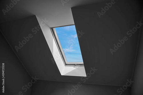 Interior view from a new roof window. Dormer window.