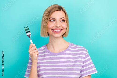 Photo portrait of young look interested mockup bob blonde hair girl hold fork want eat yummy meat steak isolated over cyan background