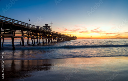 Sunset over the San Clemente pier, Orange County, California, USA. © Luis