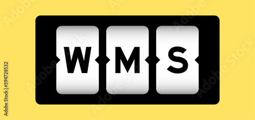 Black color in word WMS (Abbreviation of warehouse management system) on slot banner with yellow color background