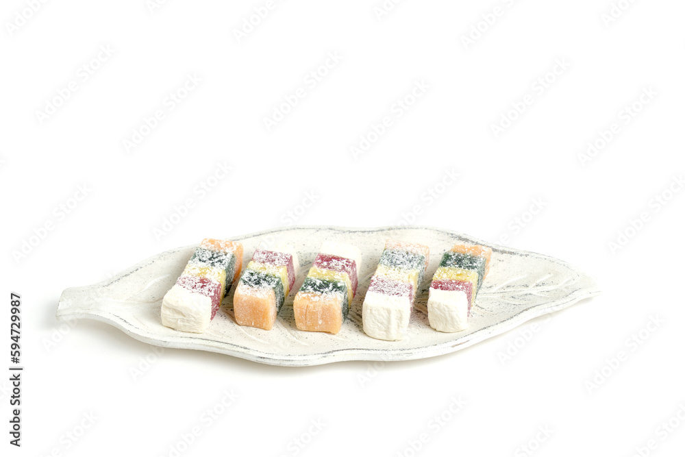 Sweet fruit Turkish delight, sprinkled with coconut chips. Sweet fruit Turkish delight, sprinkled with coconut chips.