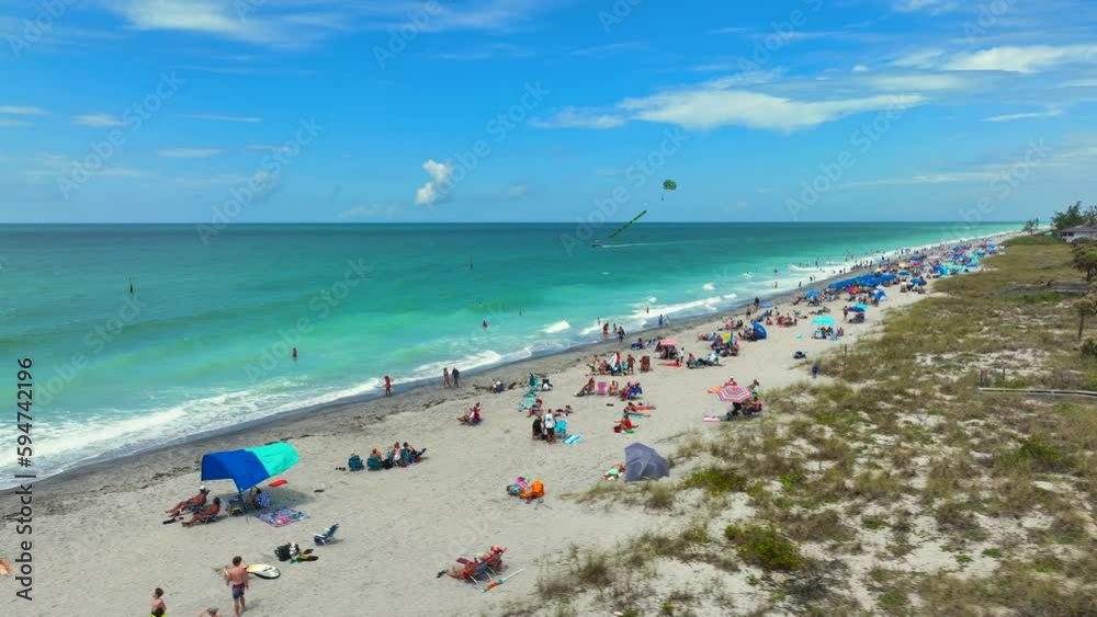 Englewood Beach on a beautiful day with a boat in the background. Englewood Beach on a beautiful day with a boat in the background.