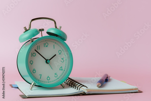 A bell alarm clock with a n...
