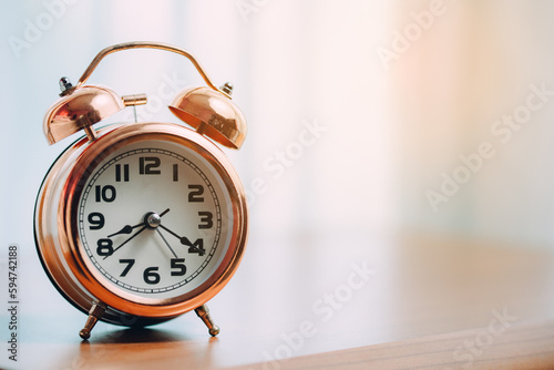 Vintage bell alarm clock on...