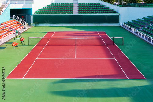 Obraz na plátně Tennis court. View of a tennis court with artificial turf