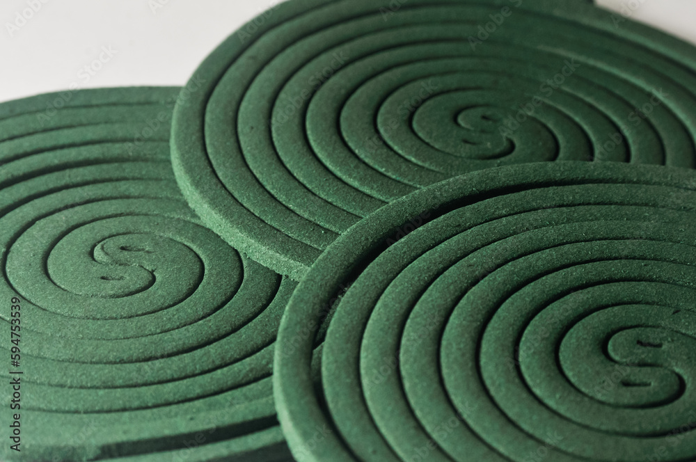Some arranged green mosquito coils can be used as a background Some arranged green mosquito coils can be used as a background