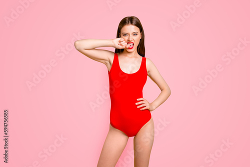 Fun joy people person resort tourism facial emotion expressing concept. Photo studio shoot portrait of tempting lovely bossy arrogant beautiful lady biting forefinger isolated bright background © deagreez