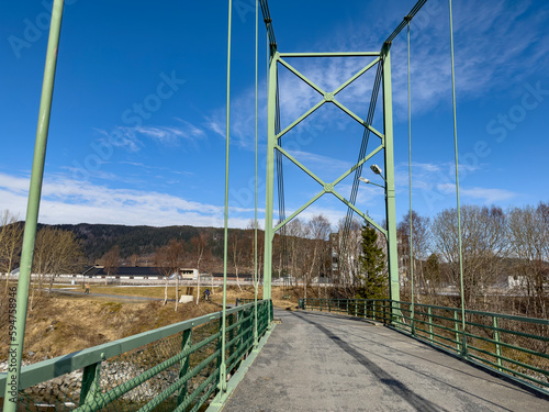 Old city bridge over the river Vefsna in Mosjoen, Helgeland, Norway photo