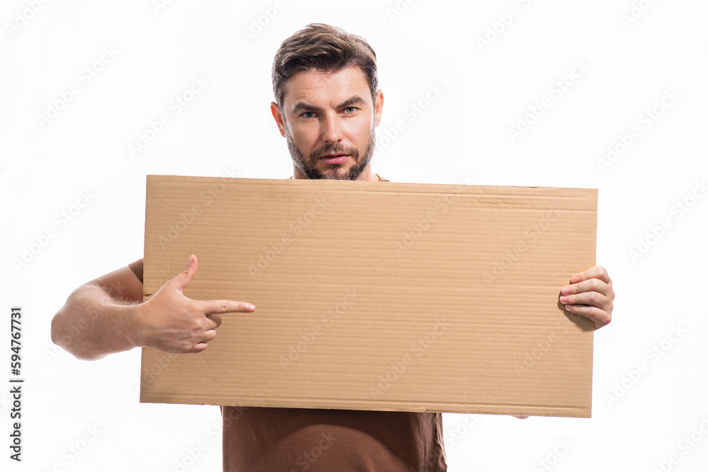 Handsome middle aged man with blank placard. Demonstrating copy space for your text or design. Man showing empty advertisement board on studio background. Blank placard, signboard for ad. Handsome middle aged man with blank placard. Demonstrating copy space for your text or design. Man showing empty advertisement board on studio background. Blank placard, signboard for ad.