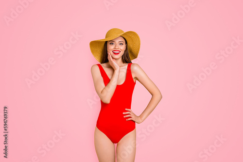 Traveler people person concept. Photo portrait of delightful funny funky fancy pretty attractive stunning girl wearing rosy bikini and straw cap isolated vivid background