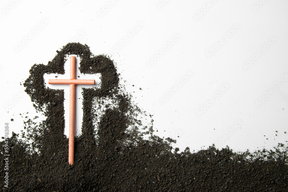top view stick cross with dark soil on a white background funeral death grim reaper
