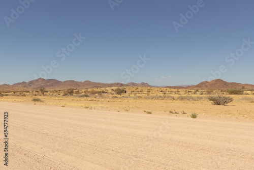 scenic view of an empty gravel road in Namibia