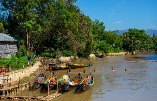 Mandalay, Myanmar, November 22, 2016: Myanmar people traveling by boat
