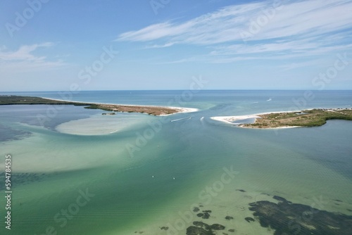 Fototapeta Naklejka Na Ścianę i Meble -  An aerial drone view of Caladesi Island, Dunedin, Florida, beautiful white beaches, and blue, green waters of the Gulf of Mexico.