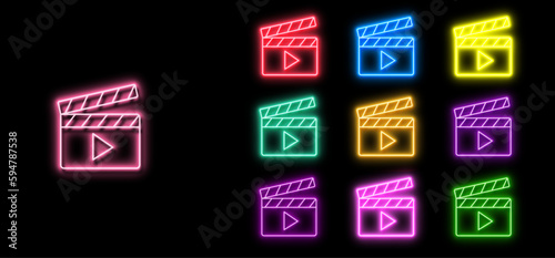 set of Glowing neon Movie clapper icon isolated on black background.