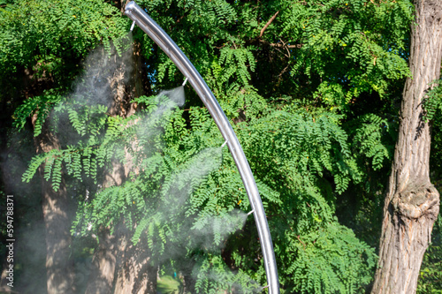 Cold water sprayer on a very hot day