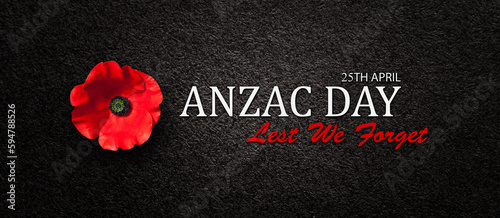 The remembrance poppy - poppy appeal. Poppy flower on black textured background with text. Banner. Decorative flower for Anzac Day in New Zealand, Australia, Canada and Great Britain.