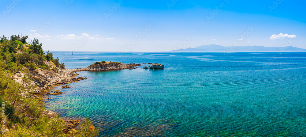Panoramic view of rocks and blue water near Kavala, Greece, Europe