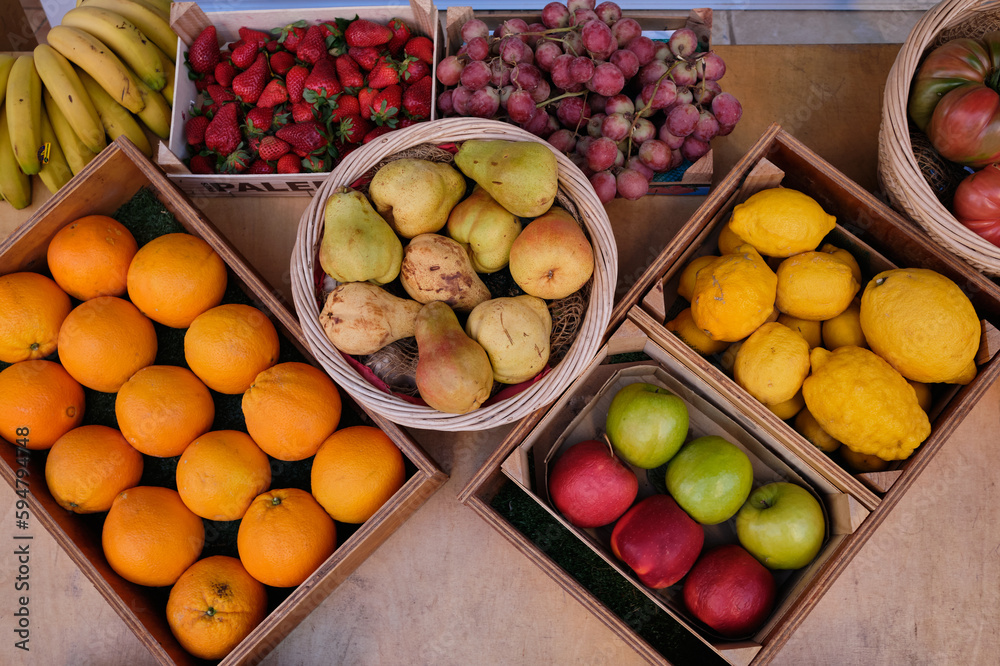 Isolated fruits and vegetables on wood background.Fruit and vegetable shop on the street .Street market in Spain.