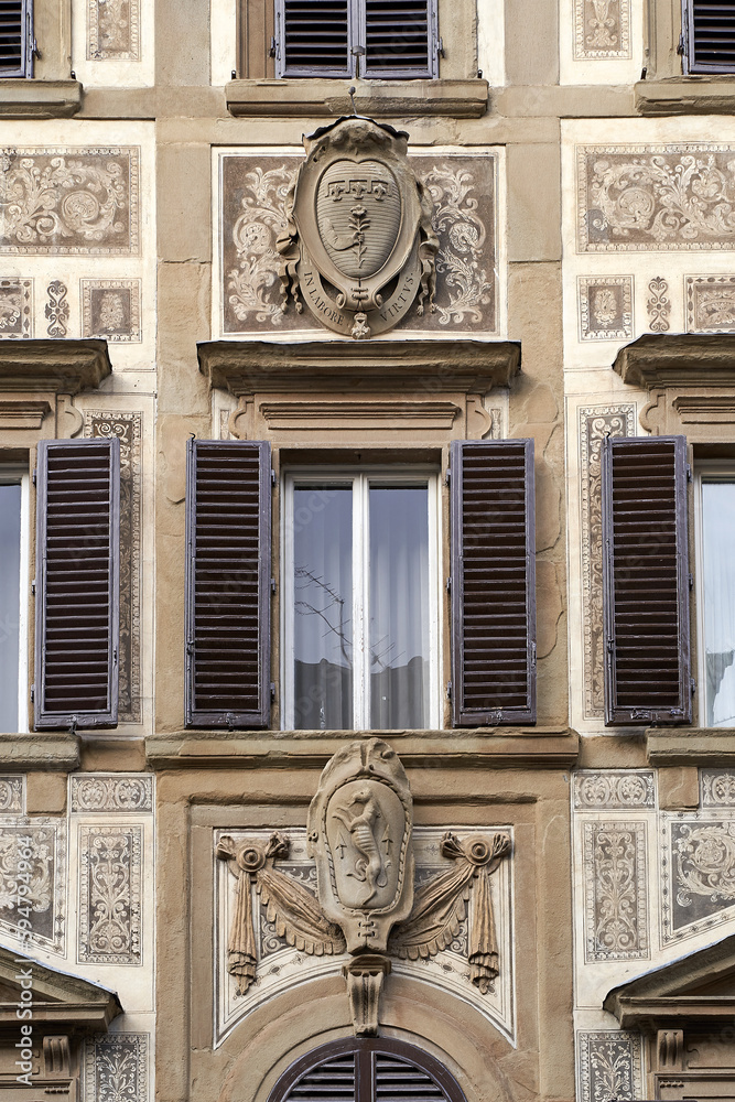 Architecture details of an old house in Florence, Italy