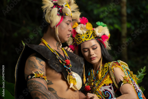 A Borneo couple showcasing the beauty of her culture through stunning traditional clothing photo