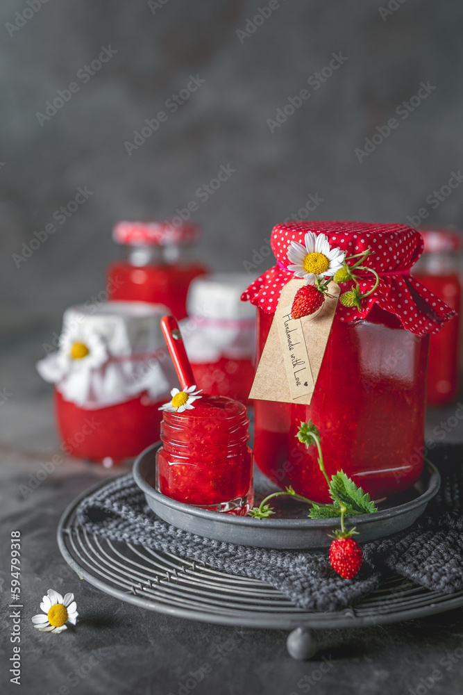 Fresh strawberry jam in a jar. Winter preserves.
